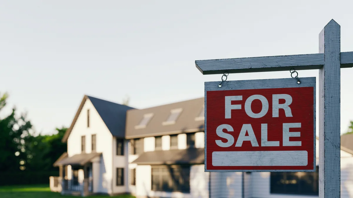 For sale sign in front of a house – National Association of Realtors commission class action