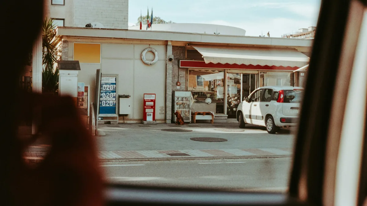 Gas station forecourt seen from a car window – Circle K data breach class action