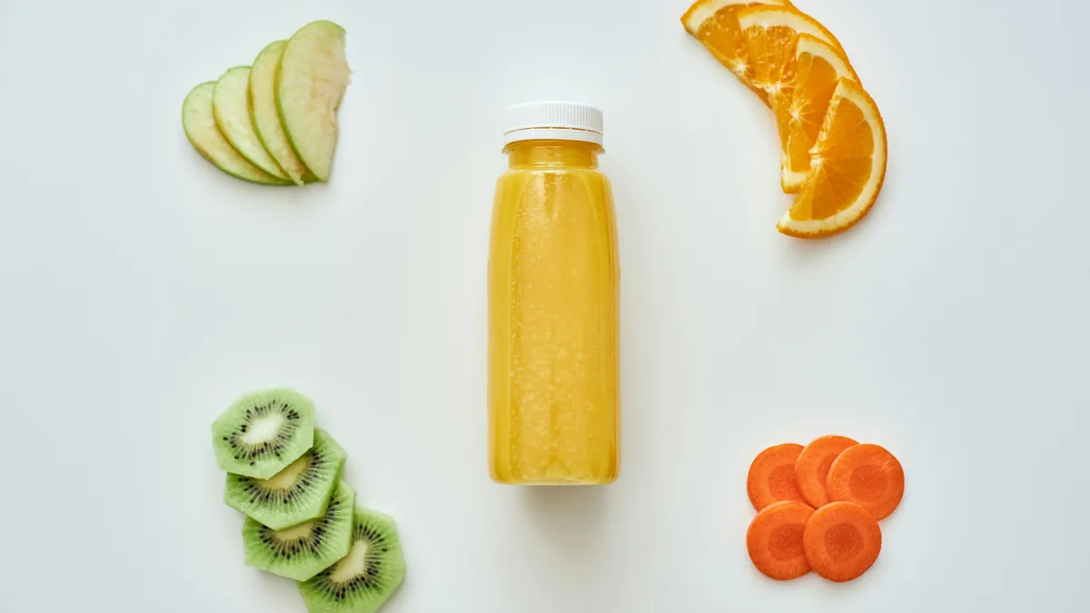 Bottle of juice surrounded by sliced fruit – Joint Juice class action